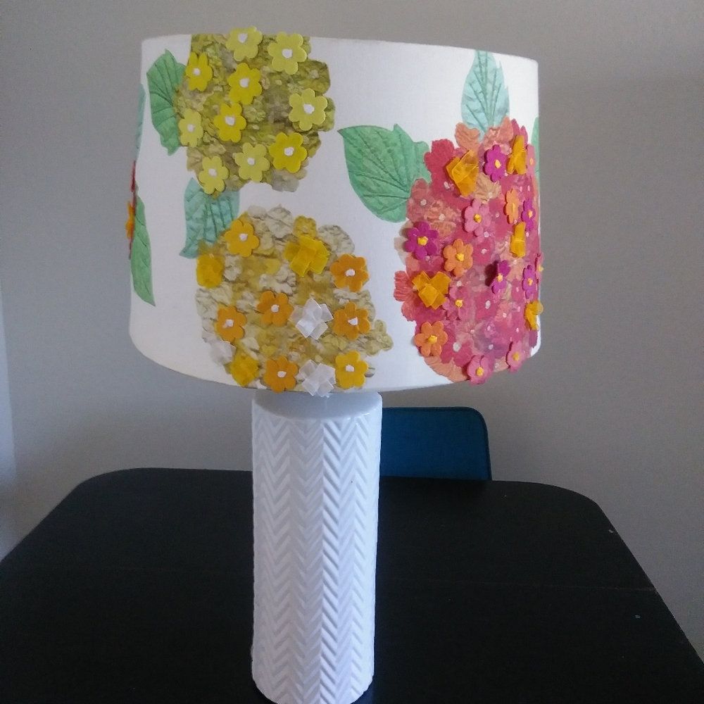 Lamp with lamp shade.